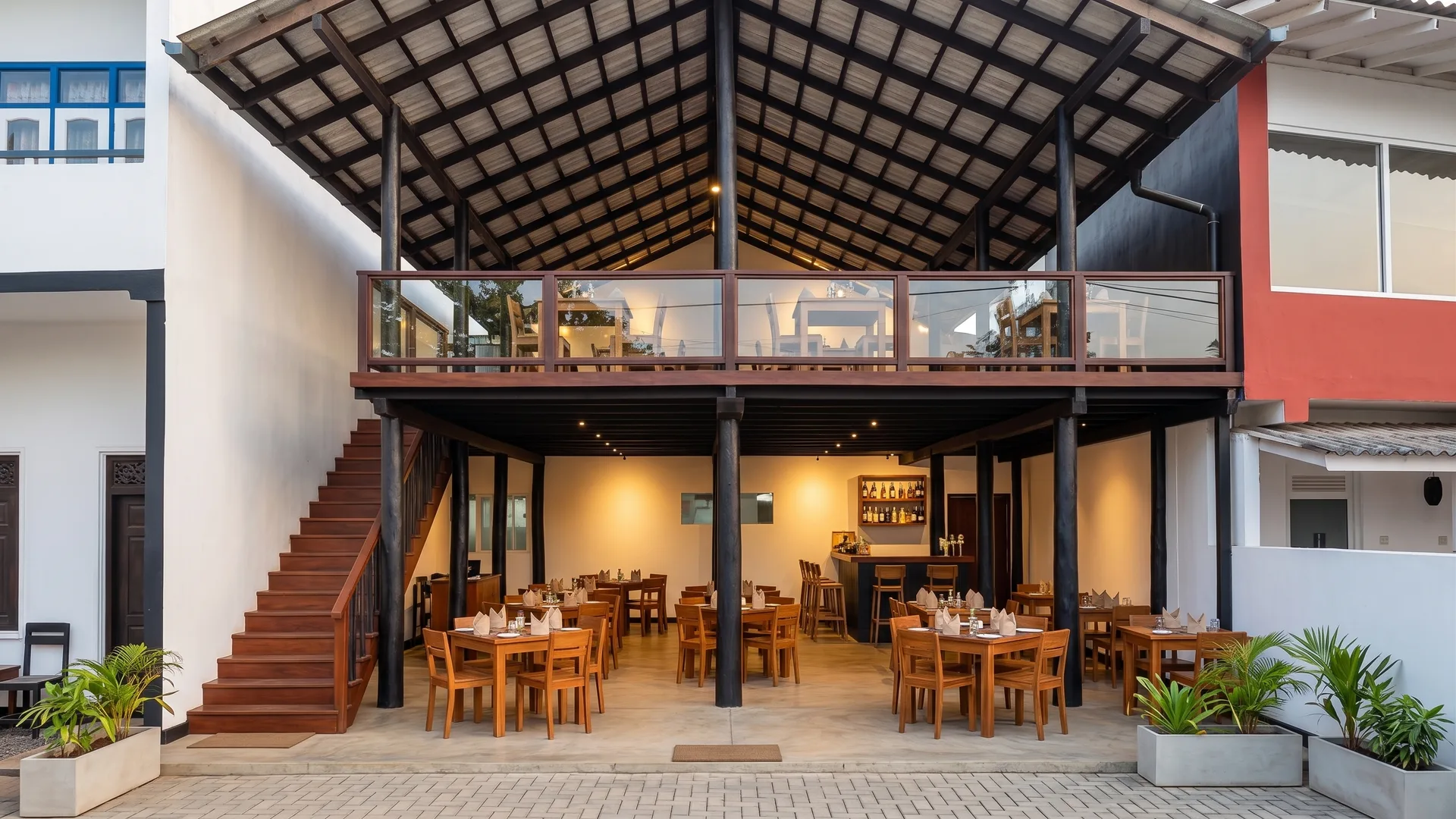 Open-air restaurant at Hotel LeanAt83 — dining area with tropical garden setting, Ahangama, Sri Lanka